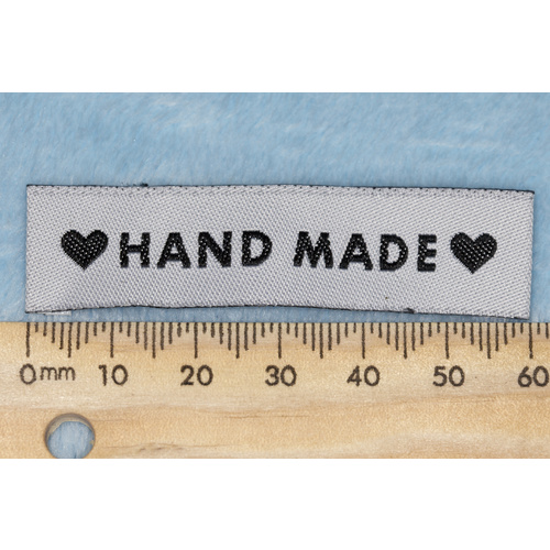 Tag,white, black embroidered wording "HAND MADE " with 2 black heart symbols
