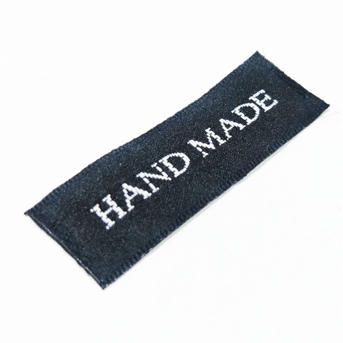 Tag,black, silver embroidered wording "Handmade "